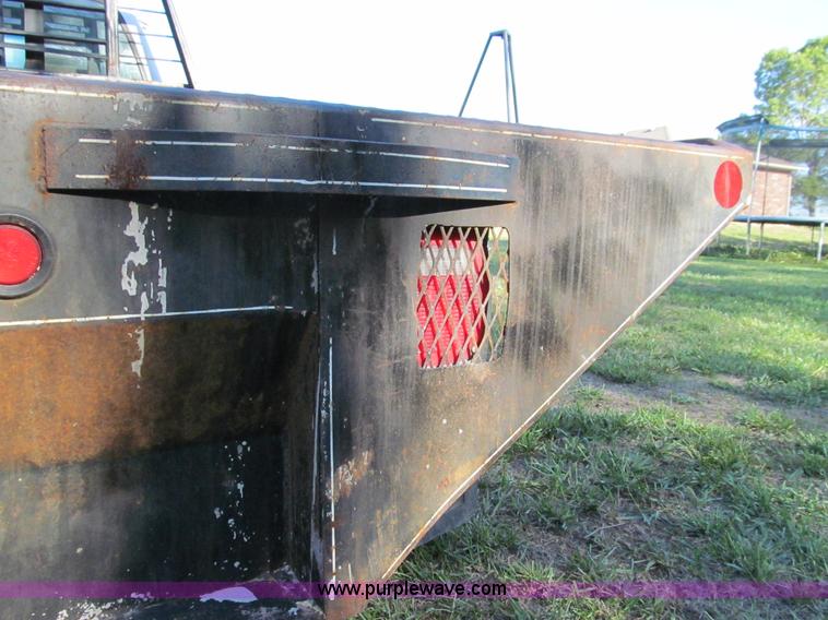 image for item E3509 1999 Ford F350 Super Duty flatbed pickup truck