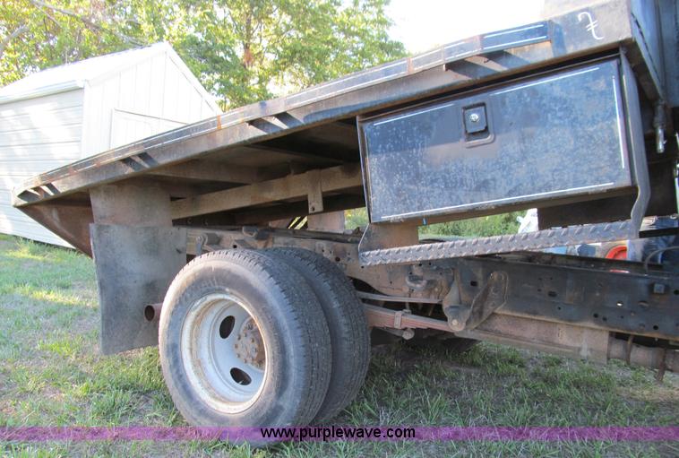 image for item E3509 1999 Ford F350 Super Duty flatbed pickup truck