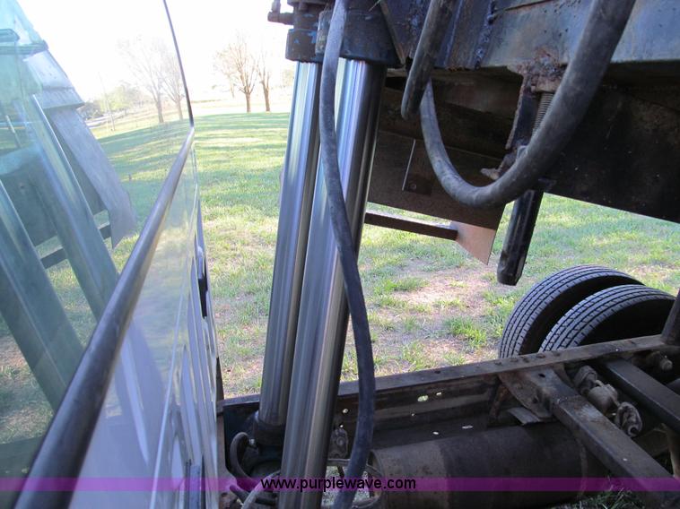 image for item E3509 1999 Ford F350 Super Duty flatbed pickup truck