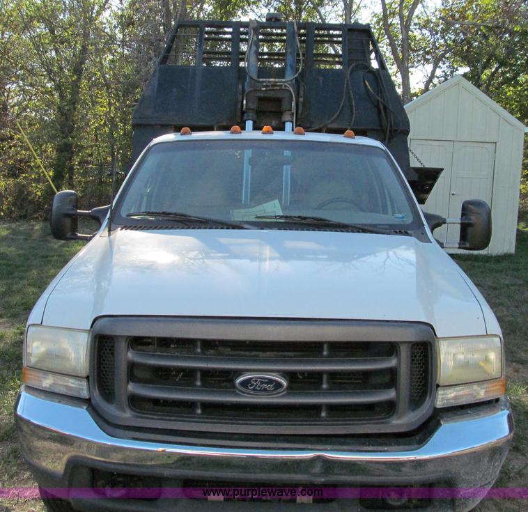 image for item E3509 1999 Ford F350 Super Duty flatbed pickup truck