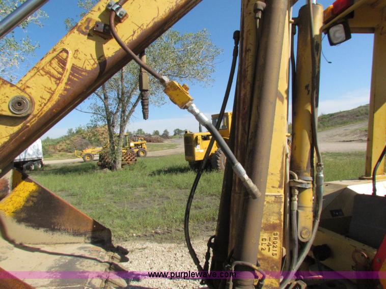 image for item E8043 1986 Caterpillar 416 backhoe