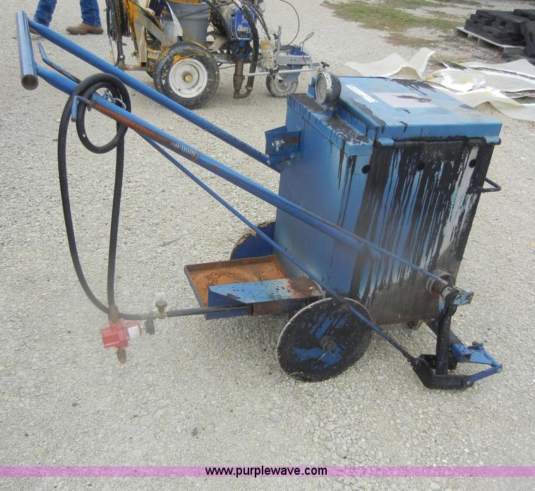 Hot tar dispensing pot in Manhattan, KS Item U9335 sold Purple Wave