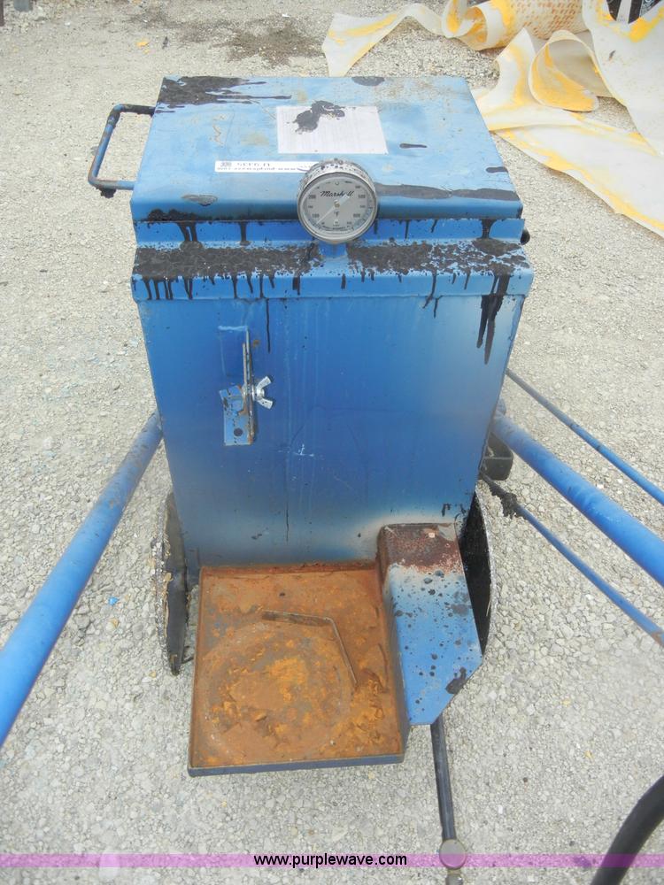 Hot tar dispensing pot in Manhattan, KS Item U9335 sold Purple Wave