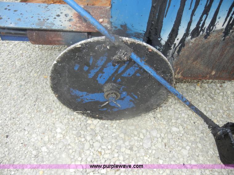 Hot tar dispensing pot in Manhattan, KS Item U9335 sold Purple Wave