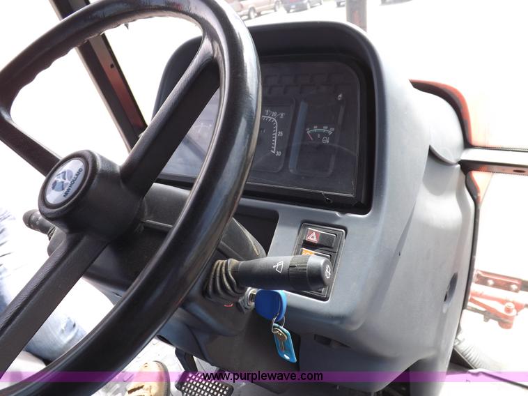 image for item C2813 1999 New Holland TS100 tractor