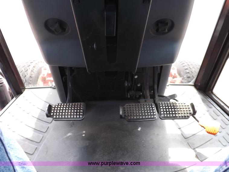 image for item C2813 1999 New Holland TS100 tractor