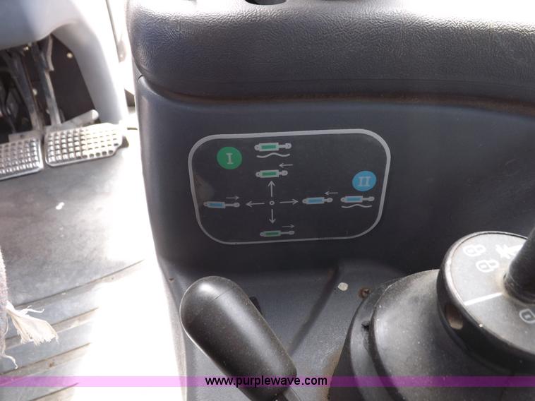 image for item C2813 1999 New Holland TS100 tractor