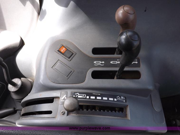 image for item C2813 1999 New Holland TS100 tractor