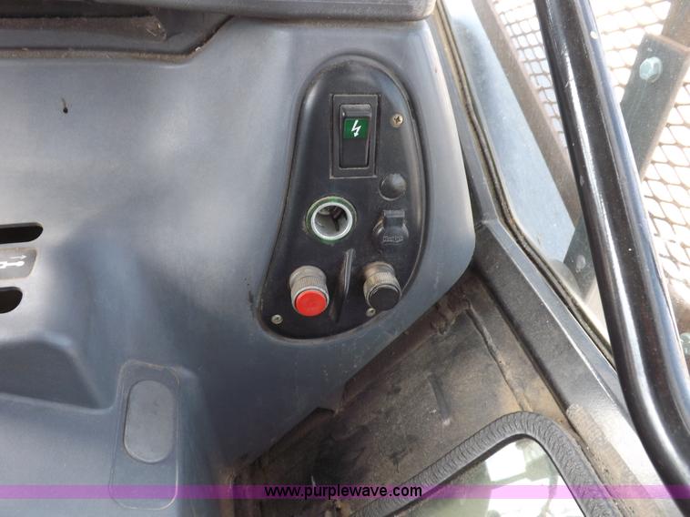 image for item C2813 1999 New Holland TS100 tractor