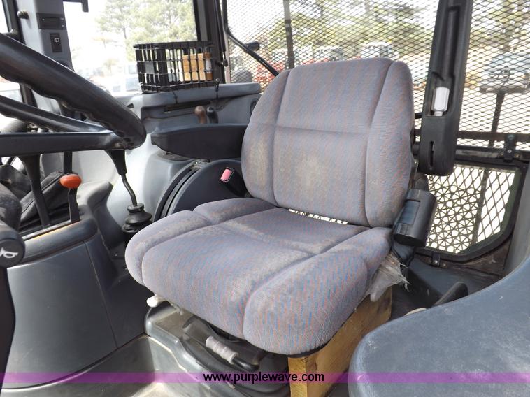 image for item C2813 1999 New Holland TS100 tractor