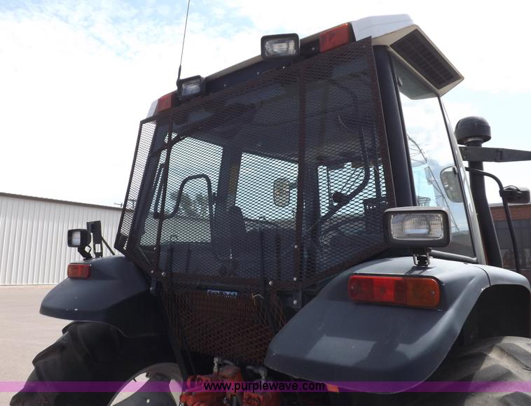 image for item C2813 1999 New Holland TS100 tractor