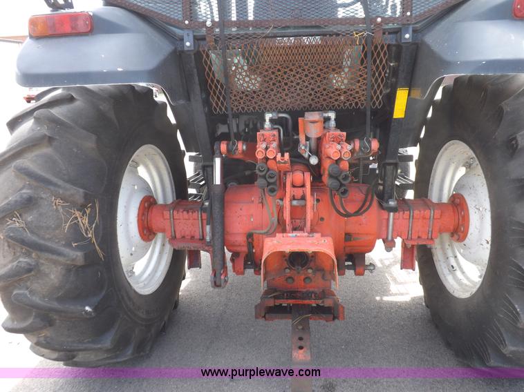 image for item C2813 1999 New Holland TS100 tractor