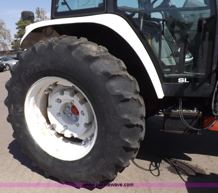 image for item C2815 1997 New Holland 7740SL MFWD tractor