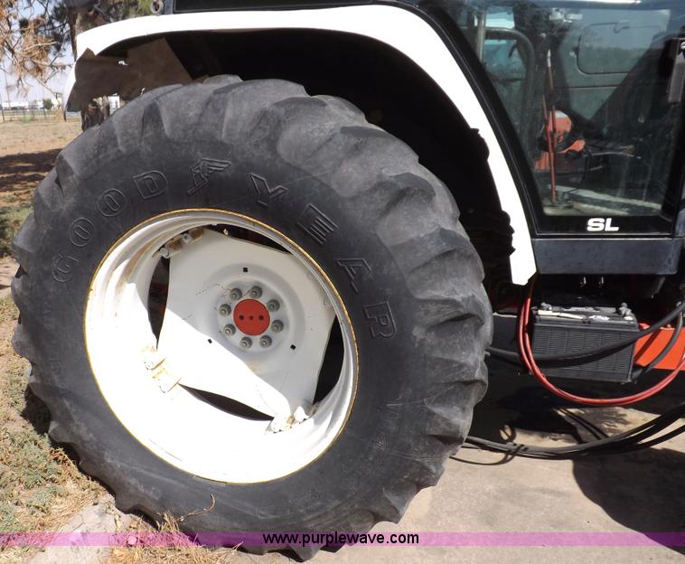 image for item C2818 1996 New Holland 7740SL MFWD tractor