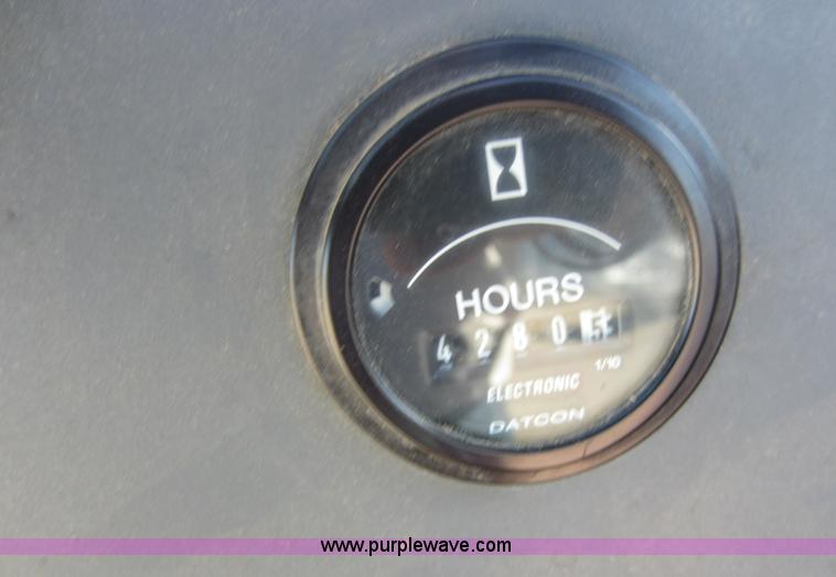 image for item F6514 1997 New Holland 6640SL tractor