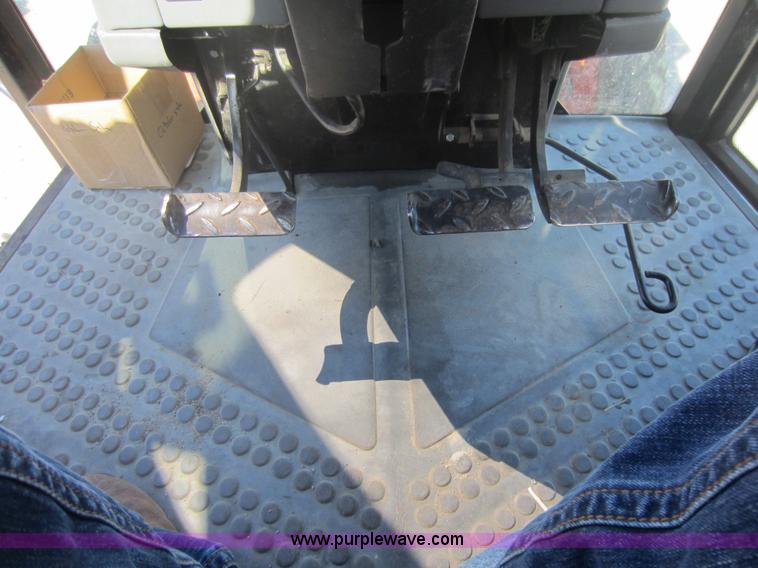 image for item F6514 1997 New Holland 6640SL tractor