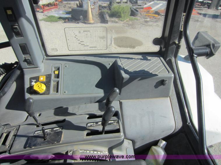 image for item F6514 1997 New Holland 6640SL tractor