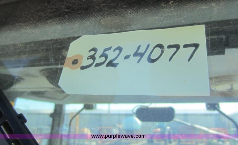 image for item F6514 1997 New Holland 6640SL tractor