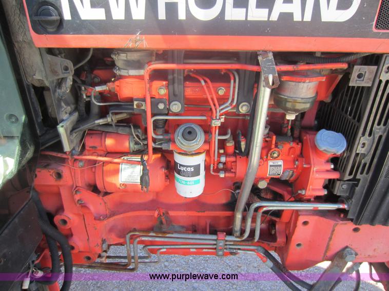 image for item F6515 1997 New Holland 6640SL tractor