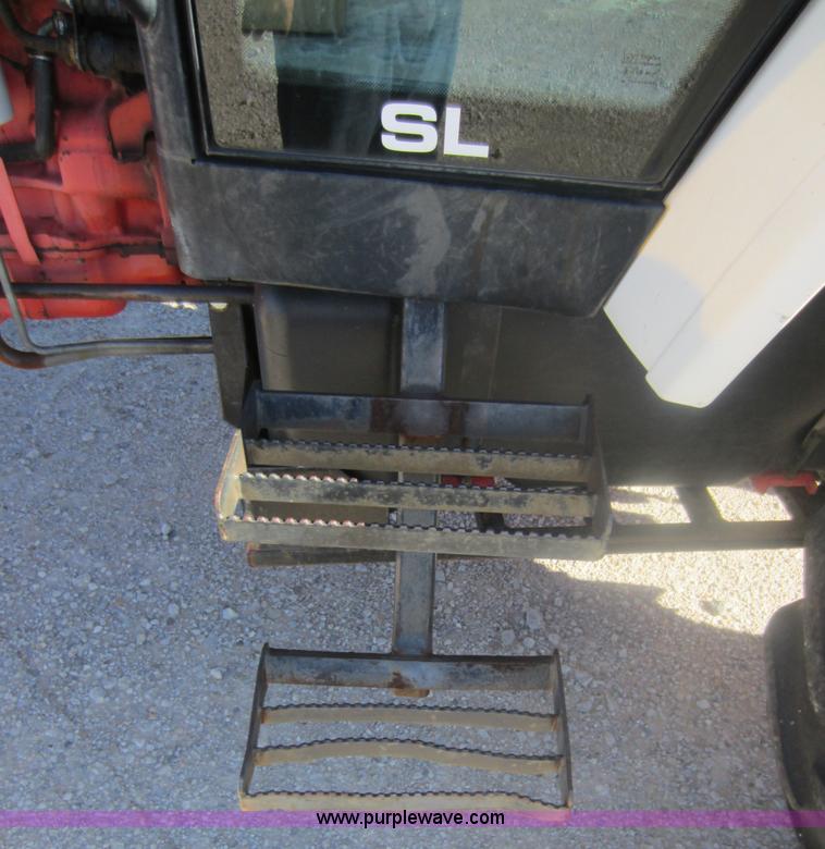 image for item F6515 1997 New Holland 6640SL tractor