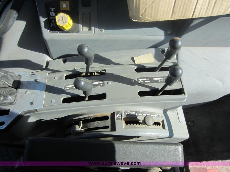 image for item F6515 1997 New Holland 6640SL tractor