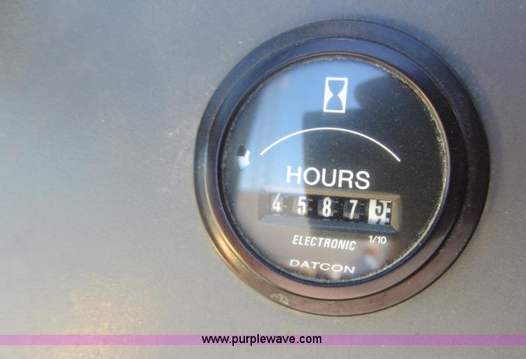 image for item F6515 1997 New Holland 6640SL tractor