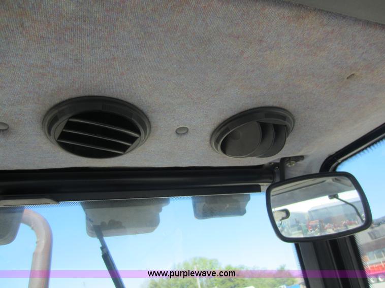 image for item F6515 1997 New Holland 6640SL tractor