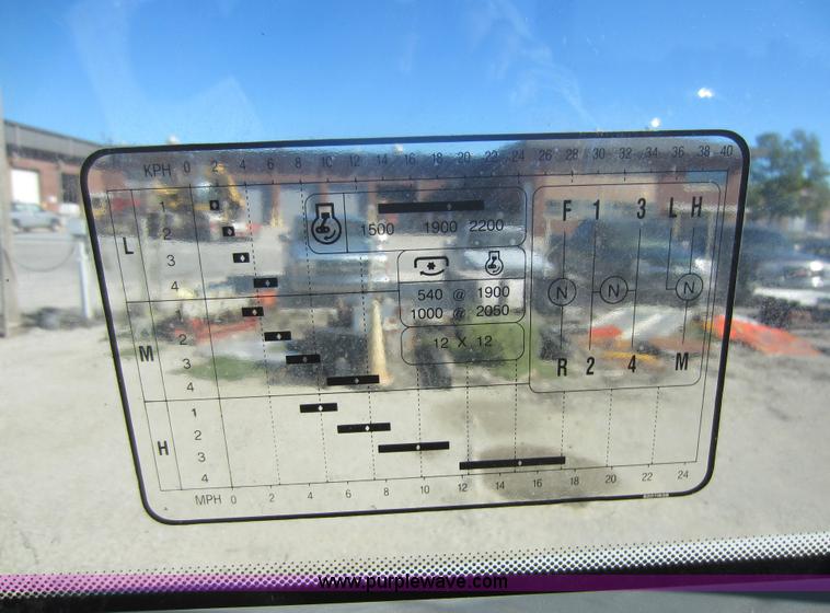 image for item F6515 1997 New Holland 6640SL tractor