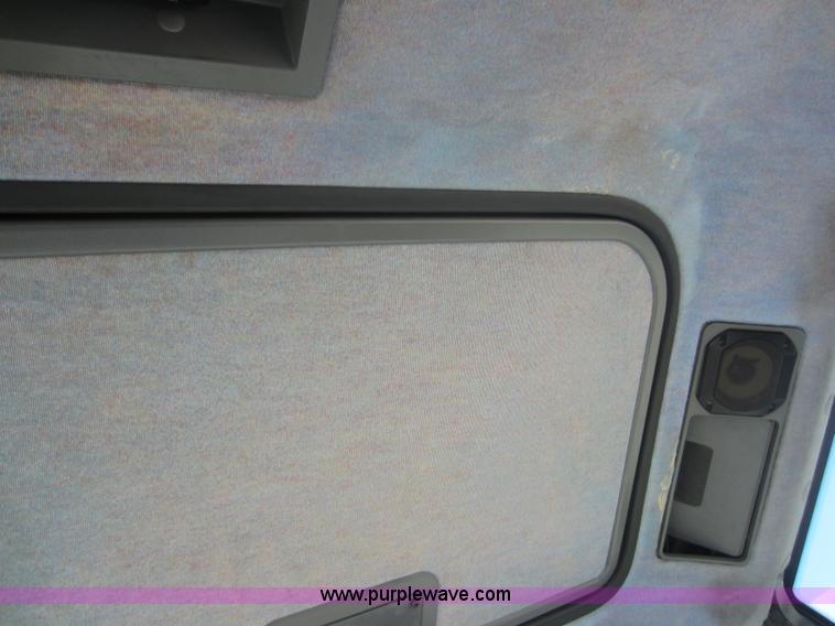 image for item F6515 1997 New Holland 6640SL tractor