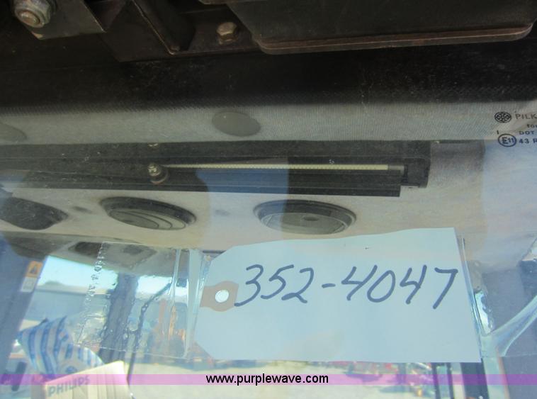 image for item F6515 1997 New Holland 6640SL tractor