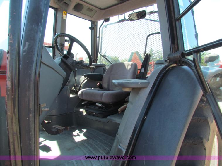 image for item G4775 2000 New Holland TS100 tractor