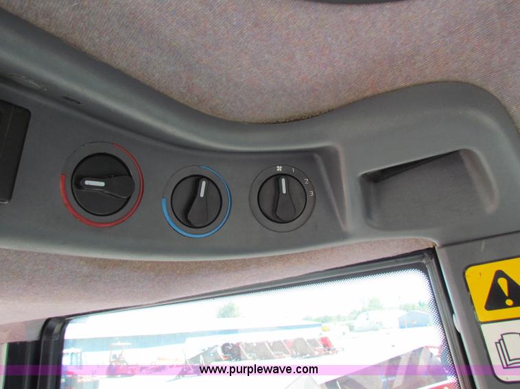 image for item G4775 2000 New Holland TS100 tractor