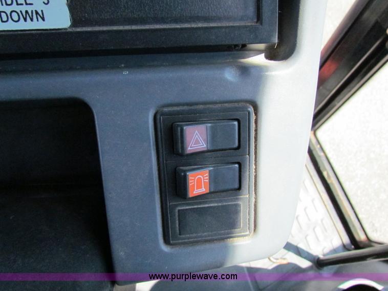 image for item G4775 2000 New Holland TS100 tractor