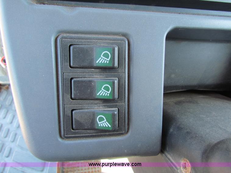 image for item G4775 2000 New Holland TS100 tractor