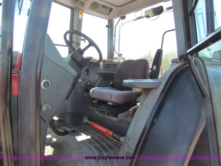 image for item G4776 1999 New Holland TS100 tractor