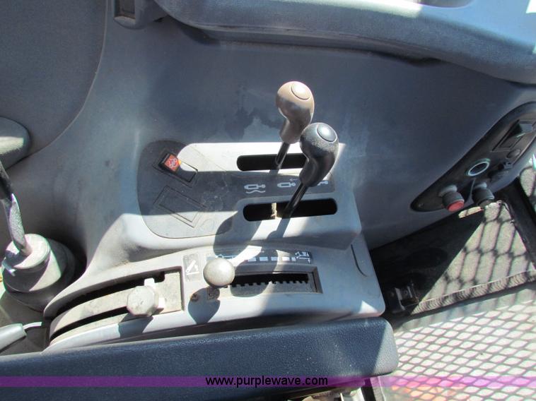 image for item G4776 1999 New Holland TS100 tractor