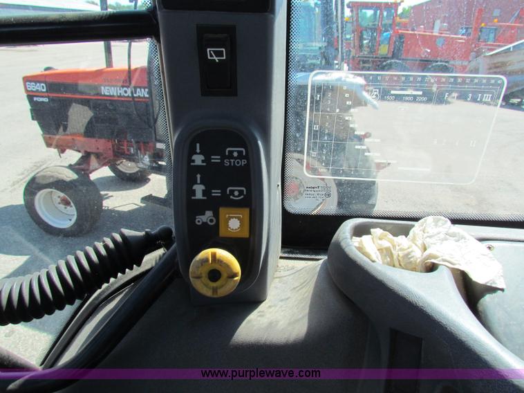 image for item G4776 1999 New Holland TS100 tractor