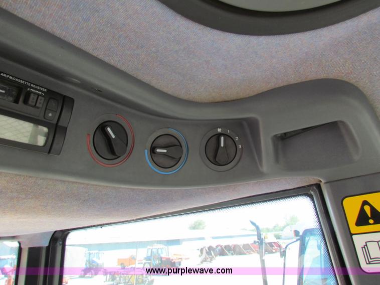 image for item G4776 1999 New Holland TS100 tractor