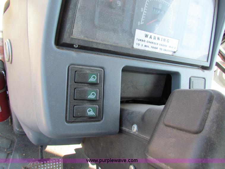 image for item G4776 1999 New Holland TS100 tractor