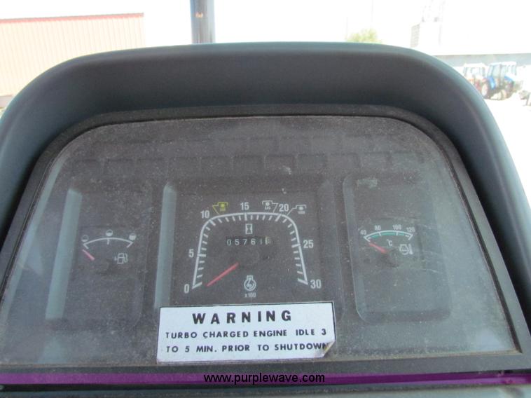 image for item G4776 1999 New Holland TS100 tractor