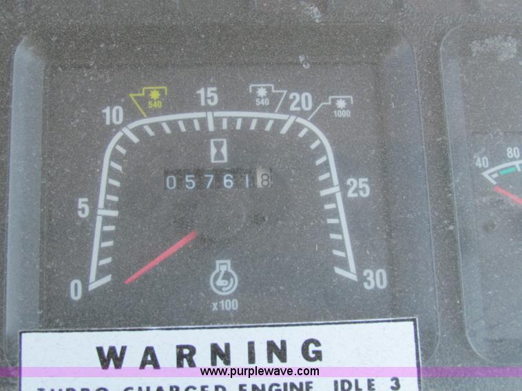 image for item G4776 1999 New Holland TS100 tractor