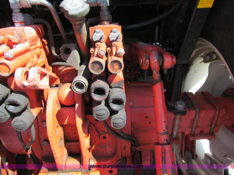 image for item G4776 1999 New Holland TS100 tractor