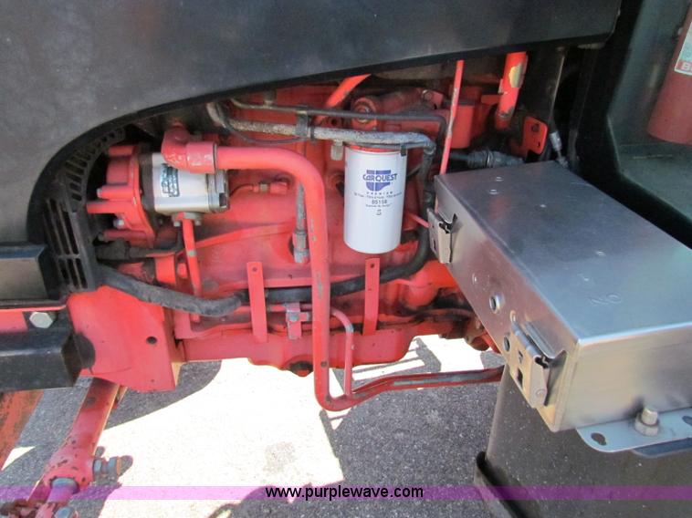 image for item G4776 1999 New Holland TS100 tractor