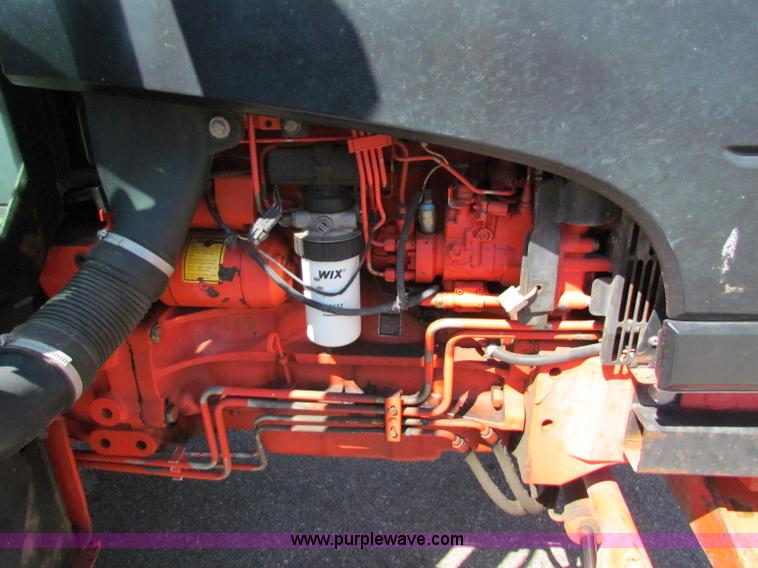 image for item G4776 1999 New Holland TS100 tractor