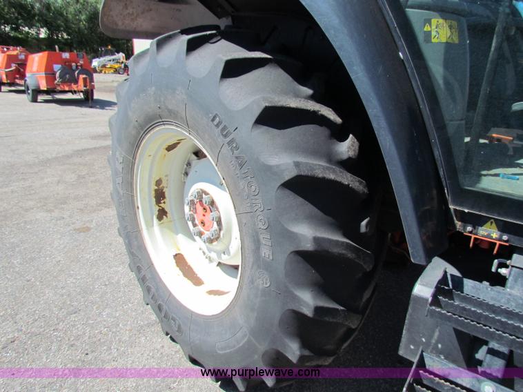 image for item G4776 1999 New Holland TS100 tractor