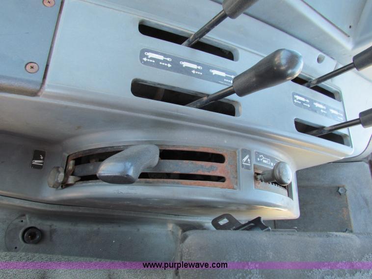 image for item G4777 1996 New Holland 6640SL tractor