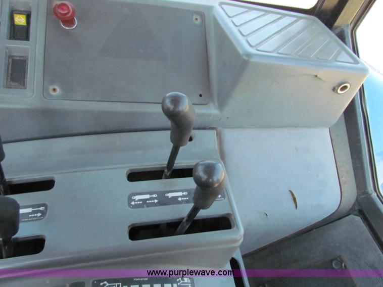 image for item G4777 1996 New Holland 6640SL tractor