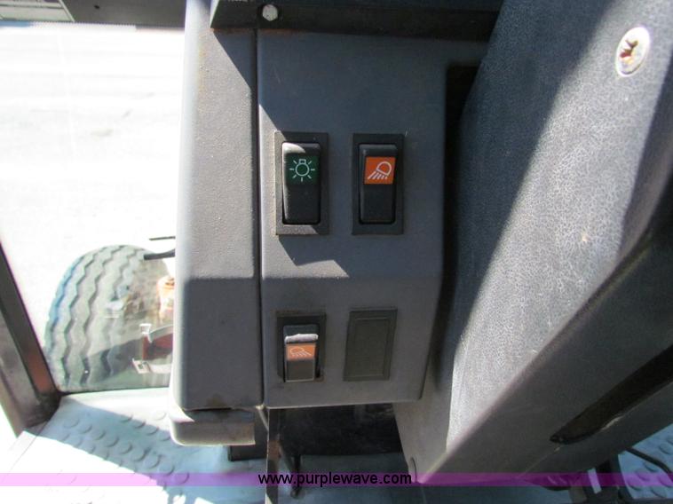 image for item G4777 1996 New Holland 6640SL tractor