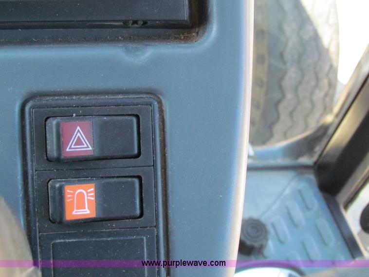 image for item G4778 2001 New Holland TS100 tractor