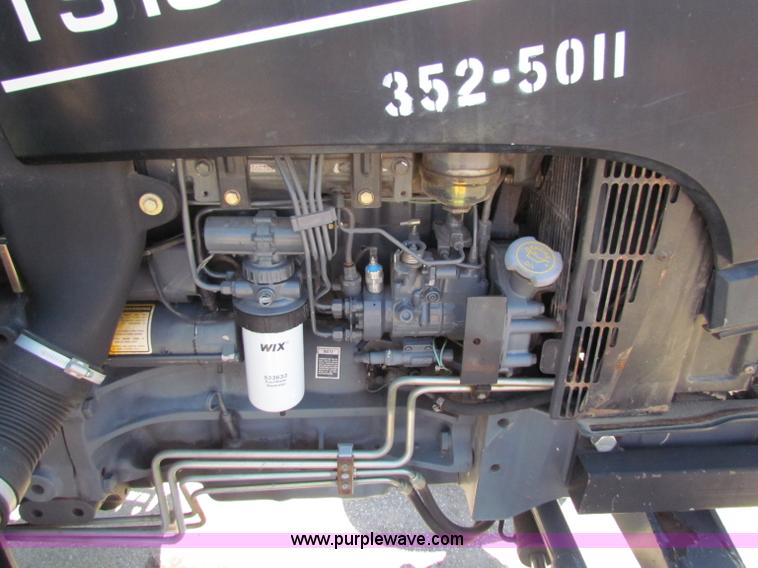 image for item G4778 2001 New Holland TS100 tractor